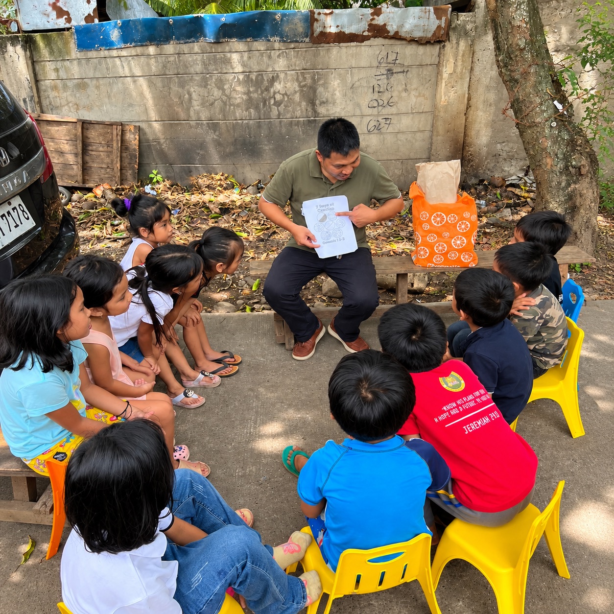 Children listening to a Bible lesson at the Aluba mission point